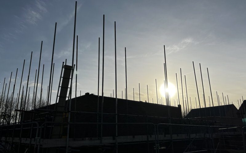 scaffolding at sunset